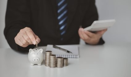 Individuals with savings, investing in stocks and funds to make Individuals with savings, investing in stocks and funds to make money grow and generate profits in the future. The concept of personal finance and investment savings.